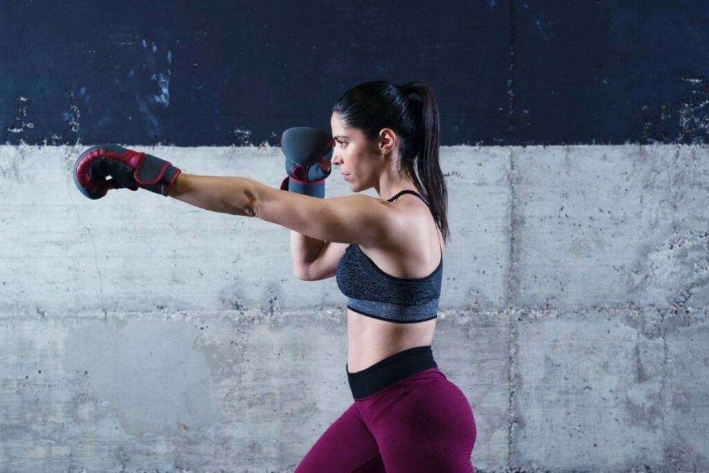 strong sexy fitness woman boxing training